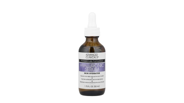 iHerb - סרום היאלורוני של Advanced Clinicals בבקבוק זכוכית חום עם פיפטה, תווית סגולה-לבנה, רקע לבן