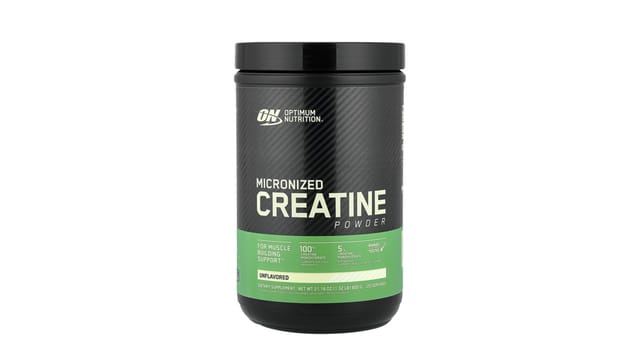 iHerb - קופסת אבקת קריאטין מיקרונייזד של Optimum Nutrition, גוון שחור עם פס ירוק, על רקע לבן